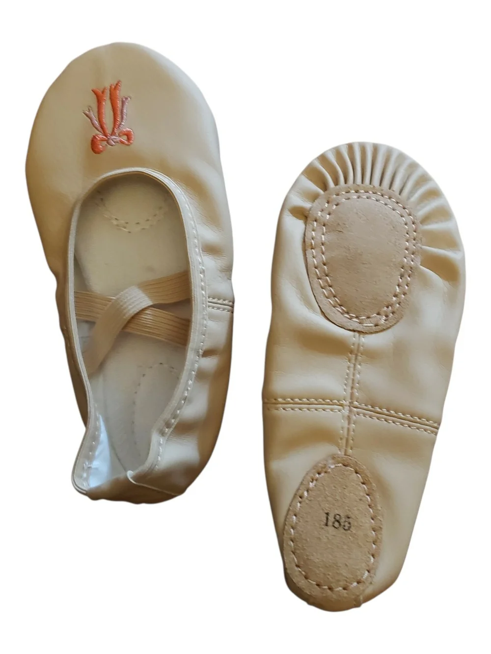 US size 12 girls cream ballet flats with pink embroidered detail.